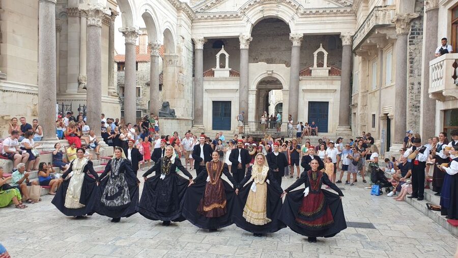 Split: History and Heritage Walking Tour - Starting under the arch at Peristil Square