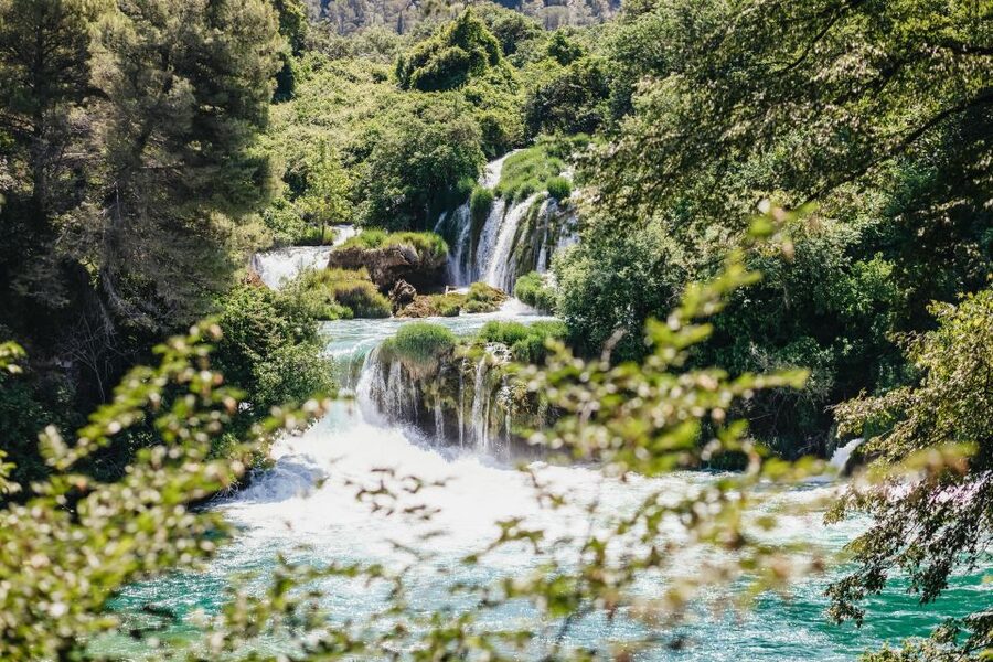 Split: Krka Waterfalls Trip with Boat Cruise and Swimming - The coastal ride to Primošten
