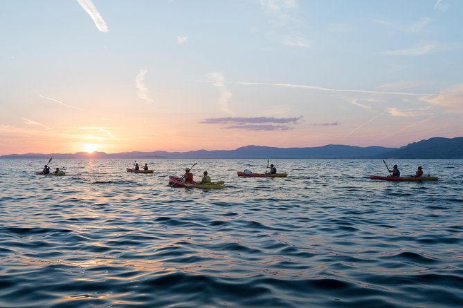 Sunset Kayaking - Paddling west along Brac Island
