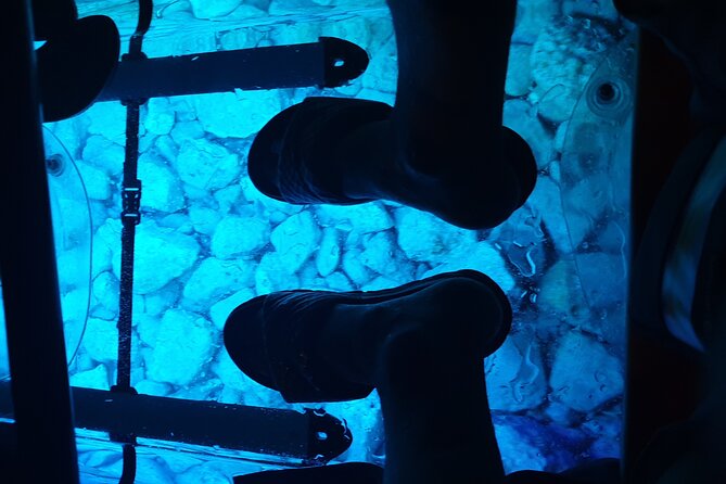 Transparent Kayak Night Glow Experience from Pula - Looking through the LED-lit hull after dark