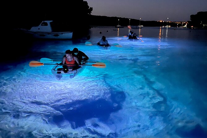 Transparent Kayak Night Glow Experience from Pula - The sea cave stop and included drink