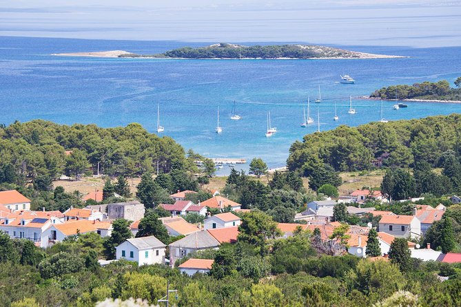 Zadar Archipelago 3 Islands Sea Kayaking Day Trip - Pebble beaches, clear water, and snorkeling stops
