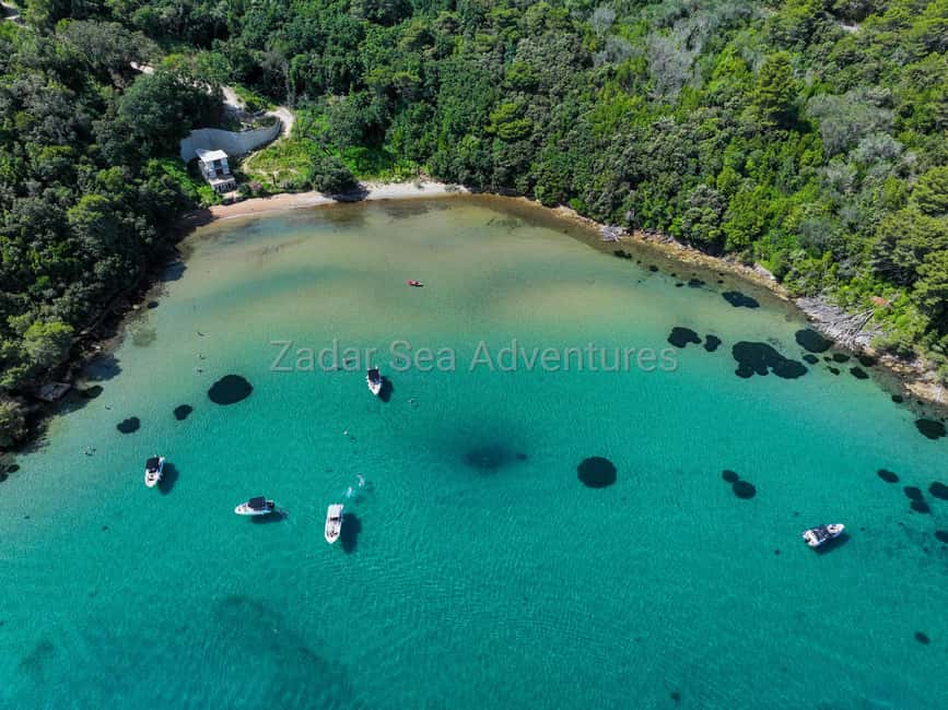 Zadar: Island Hopping Speedboat Adventure with Aperol Spritz - Third stop: choose between another cove or a fishing village