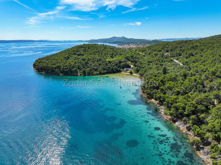Zadar: Island Hopping Speedboat Adventure with Aperol Spritz - First stop: a calm cove for swimming and snorkeling