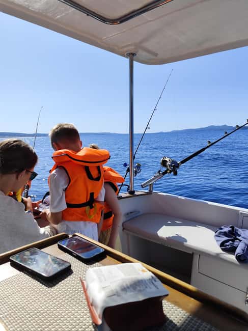 Zadar: Sunset Fishing Half-Day Guided Boat Trip - The sunset return to Zadar
