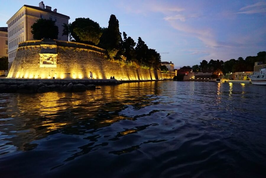 Zadar: Sunset & Nighttime Cruise with Sparkling Wine - The bridge at night and the Jazine harbor