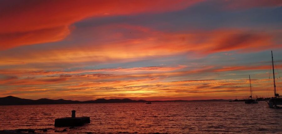 Zadar: Sunset & Nighttime Cruise with Sparkling Wine - Seating, photographs, and the small drawback